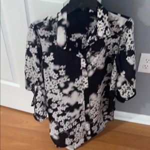 Woman’s button down dress top